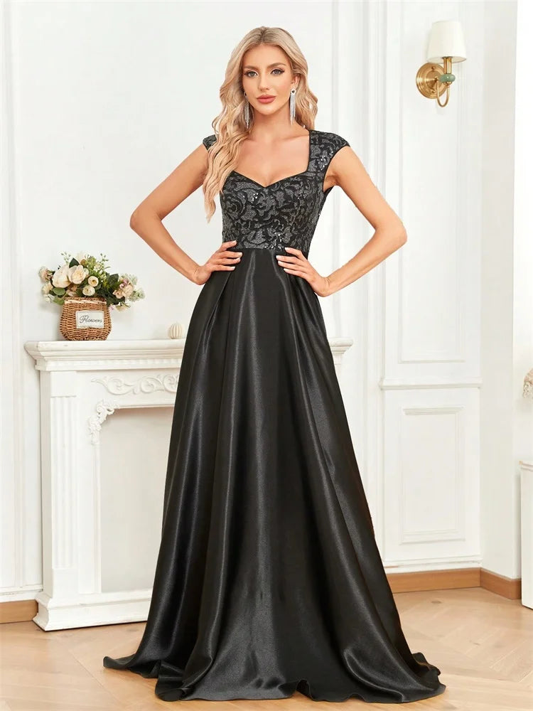 Step into luxury and sophistication with this elegant black evening gown designed for unforgettable formal occasions