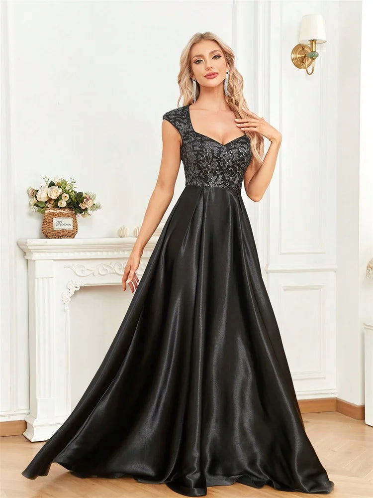 Step into luxury and sophistication with this elegant black evening gown designed for unforgettable formal occasions
