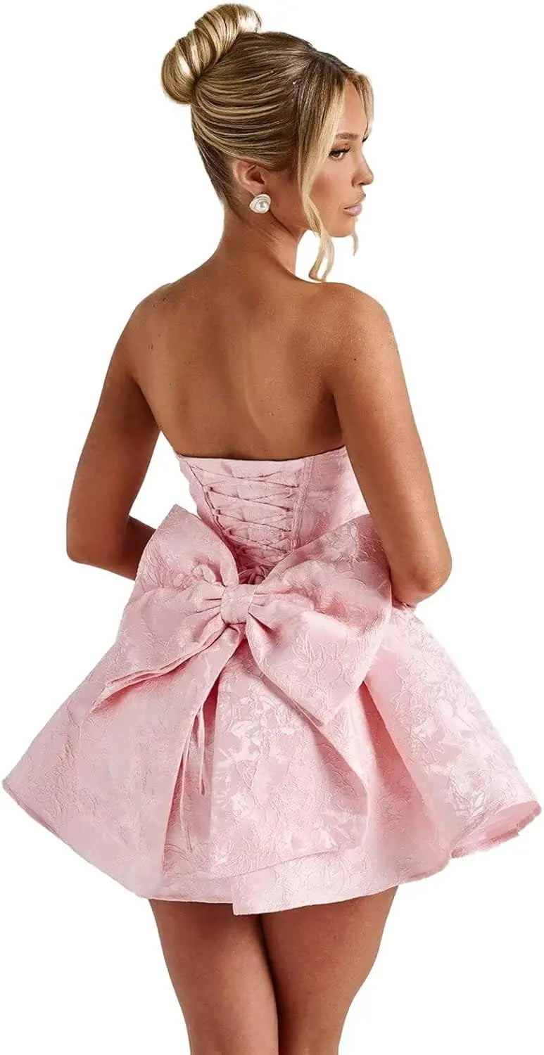 Make a dazzling entrance in this elegant strapless homecoming dress
