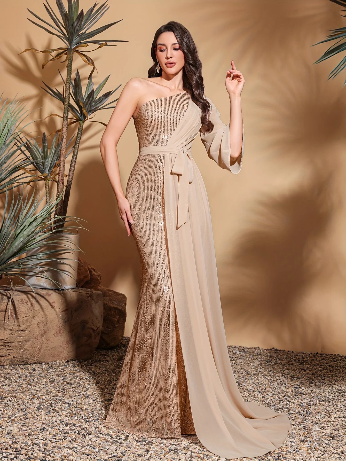 Shine with confidence in this glamorous one-shoulder evening dress