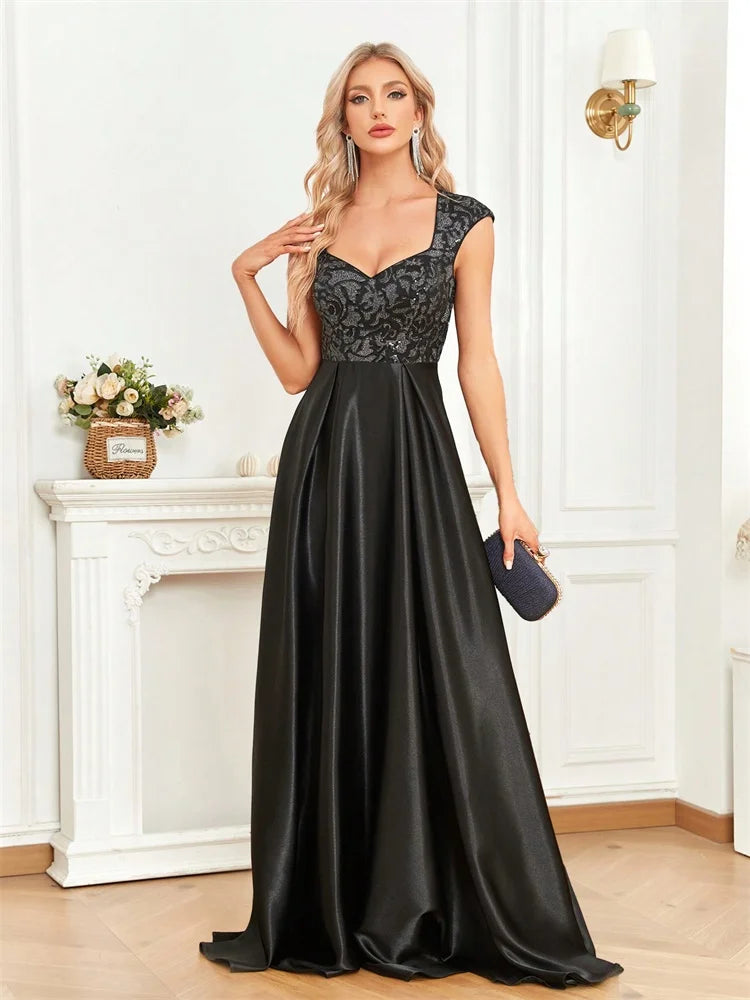 Step into luxury and sophistication with this elegant black evening gown designed for unforgettable formal occasions