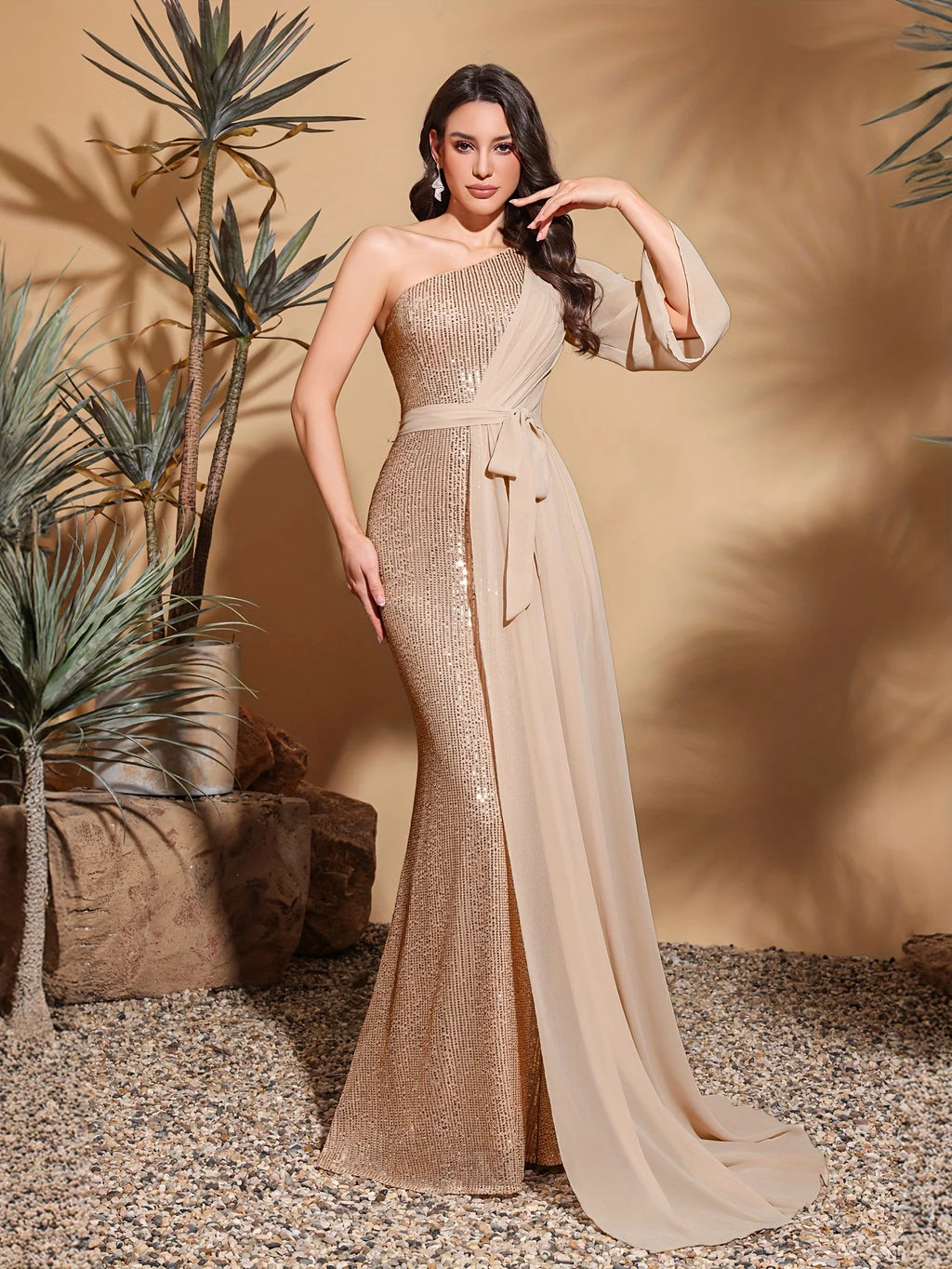 Shine with confidence in this glamorous one-shoulder evening dress