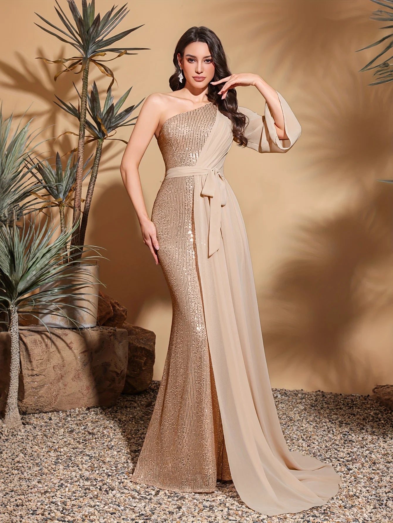 Shine with confidence in this glamorous one-shoulder evening dress