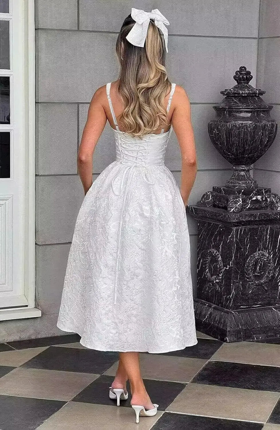 Make a graceful statement in this elegant Italian-inspired satin ball gown, designed for young women who love timeless sophistication with a modern fashionable touch. Perfect for back-to-school events