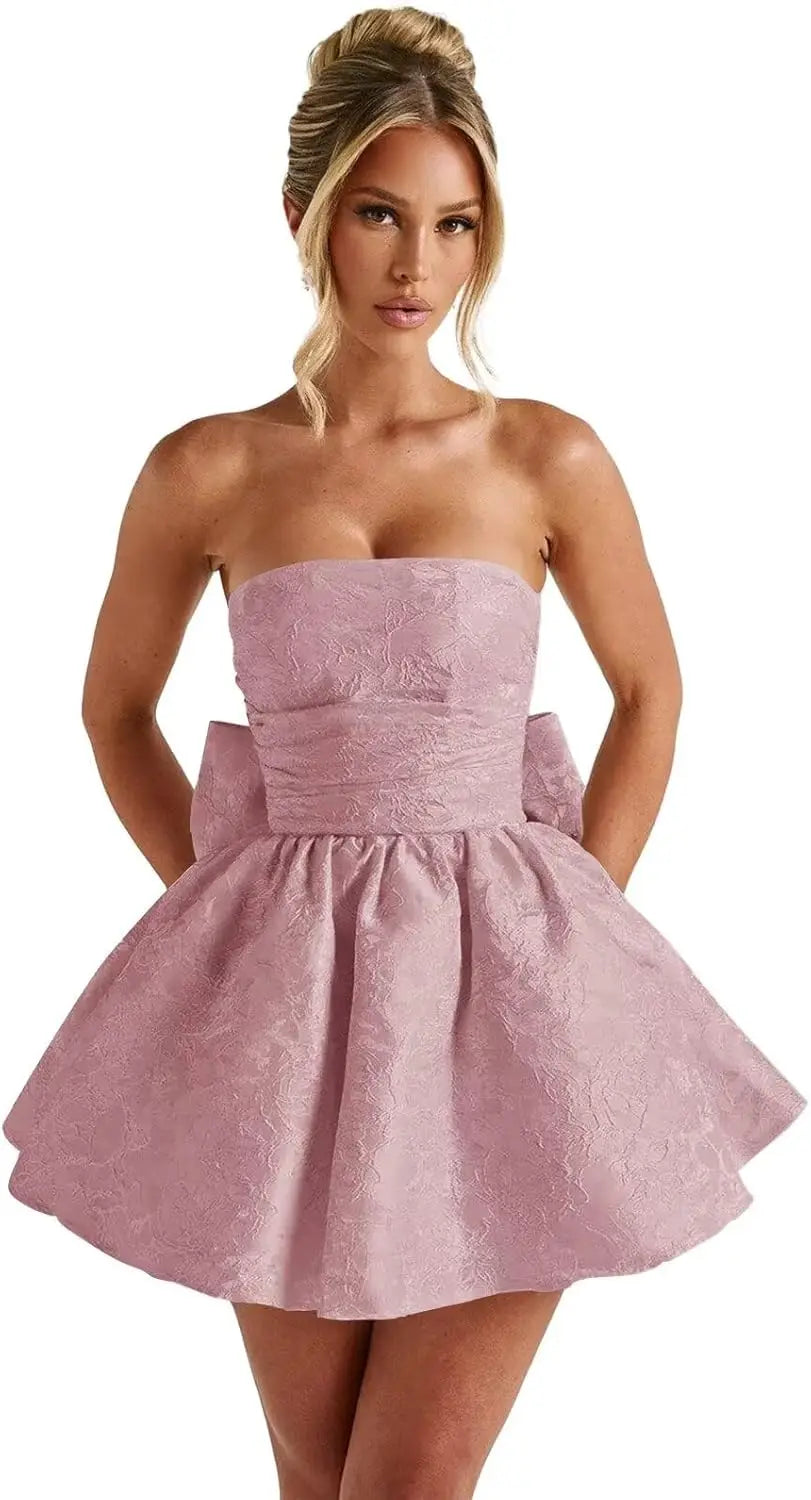 Make a dazzling entrance in this elegant strapless homecoming dress
