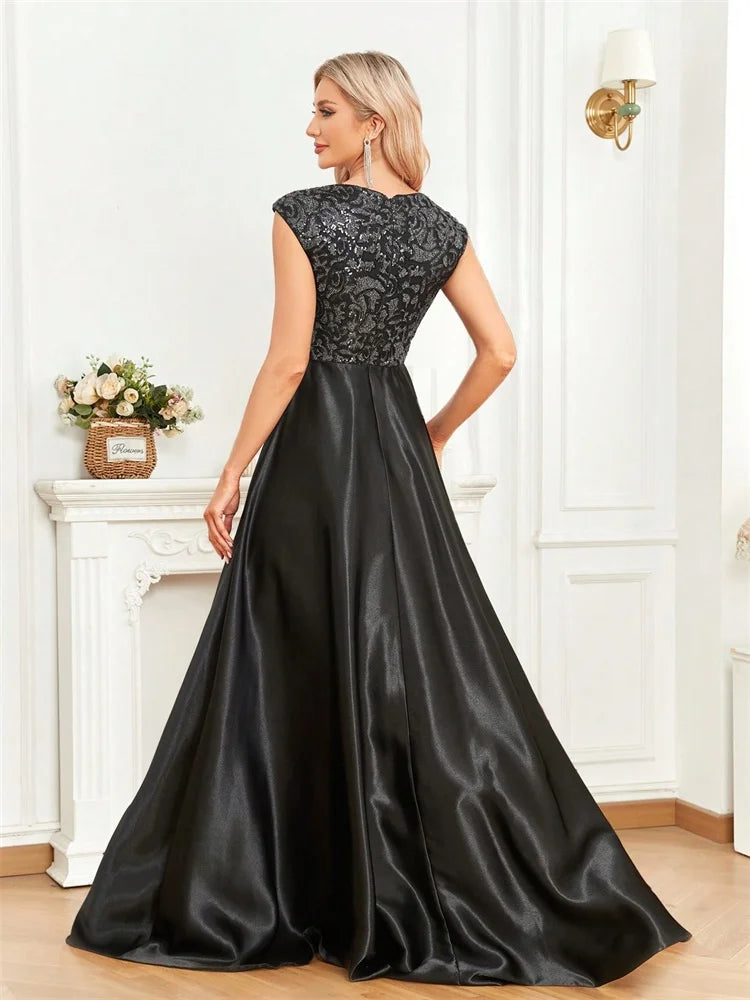 Step into luxury and sophistication with this elegant black evening gown designed for unforgettable formal occasions