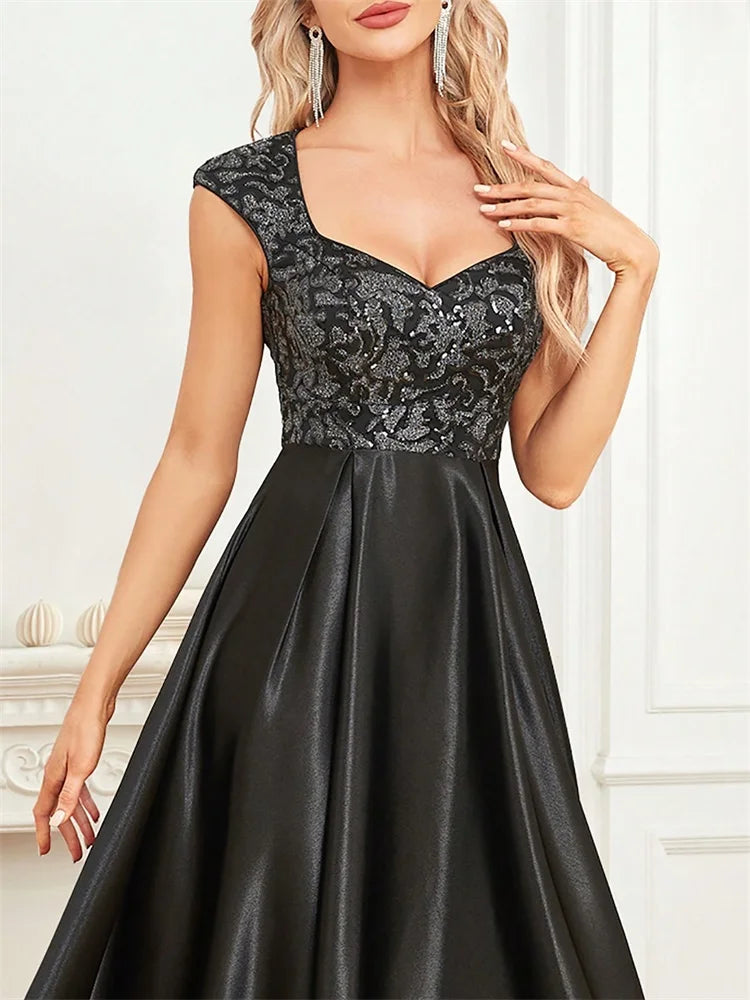 Step into luxury and sophistication with this elegant black evening gown designed for unforgettable formal occasions