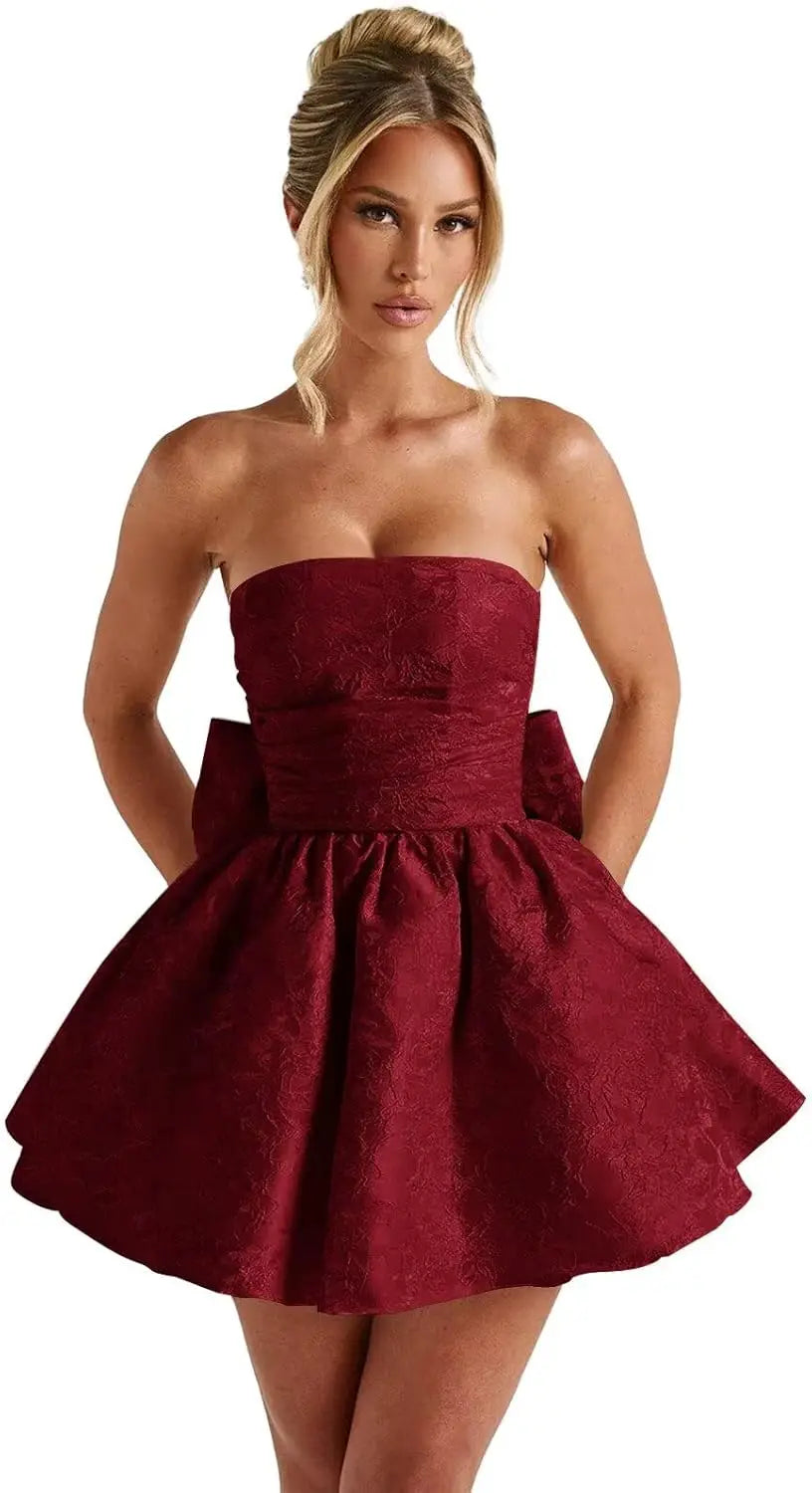 Make a dazzling entrance in this elegant strapless homecoming dress