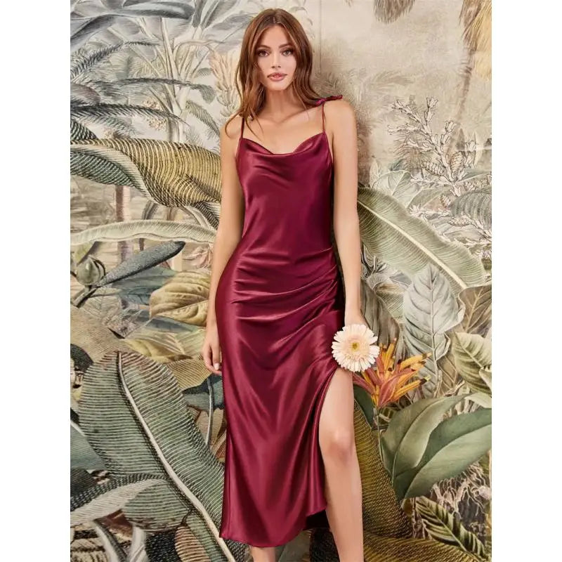 Elevate your evening style with the chic satin cocktail dress from MisShow. Designed with modern sophistication and feminine elegance, this navy blue midi gown is the perfect choice for cocktail parties, prom nights, formal d