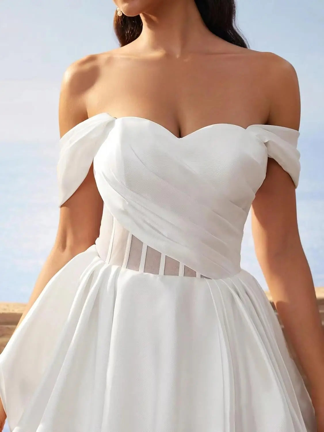 Make a graceful entrance in this elegant off-shoulder homecoming dress